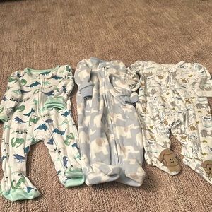 Boys one piece sleepers size 3-6 months. Variety of brands.